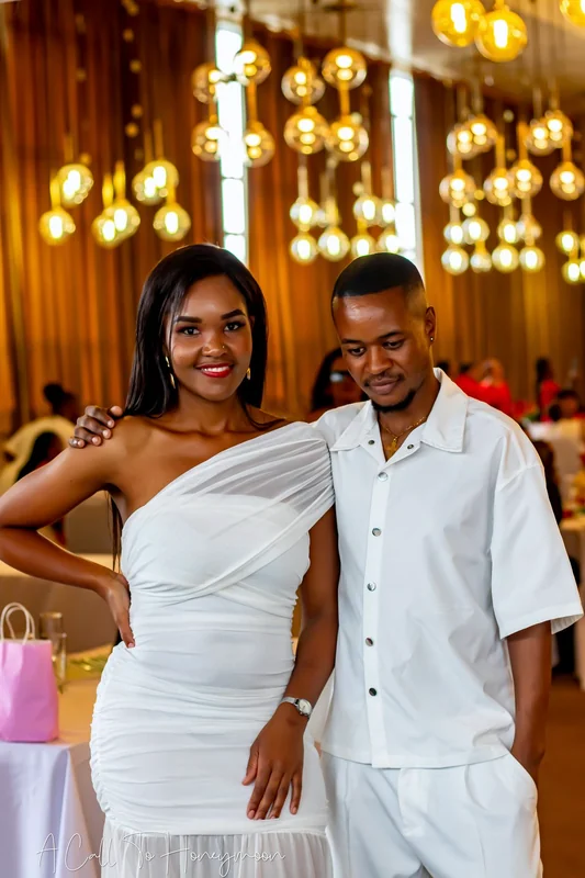 Couple standing together at a celebration