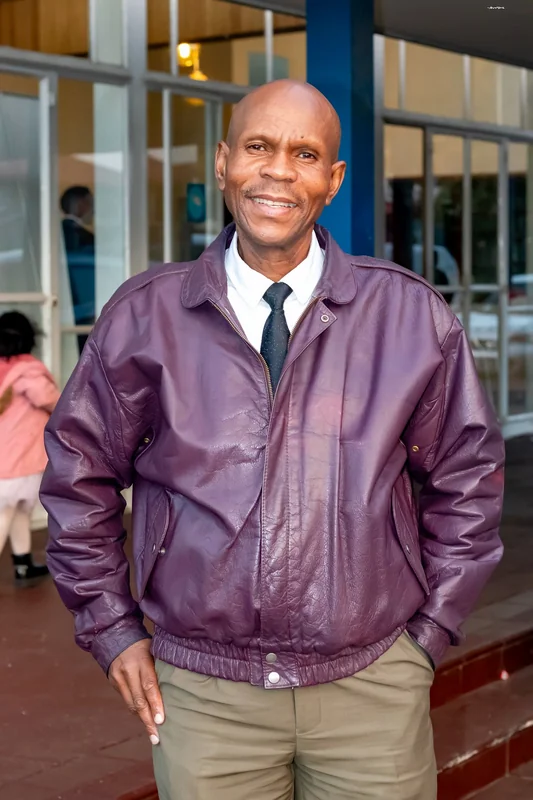 Man smiling outside the ministry venue