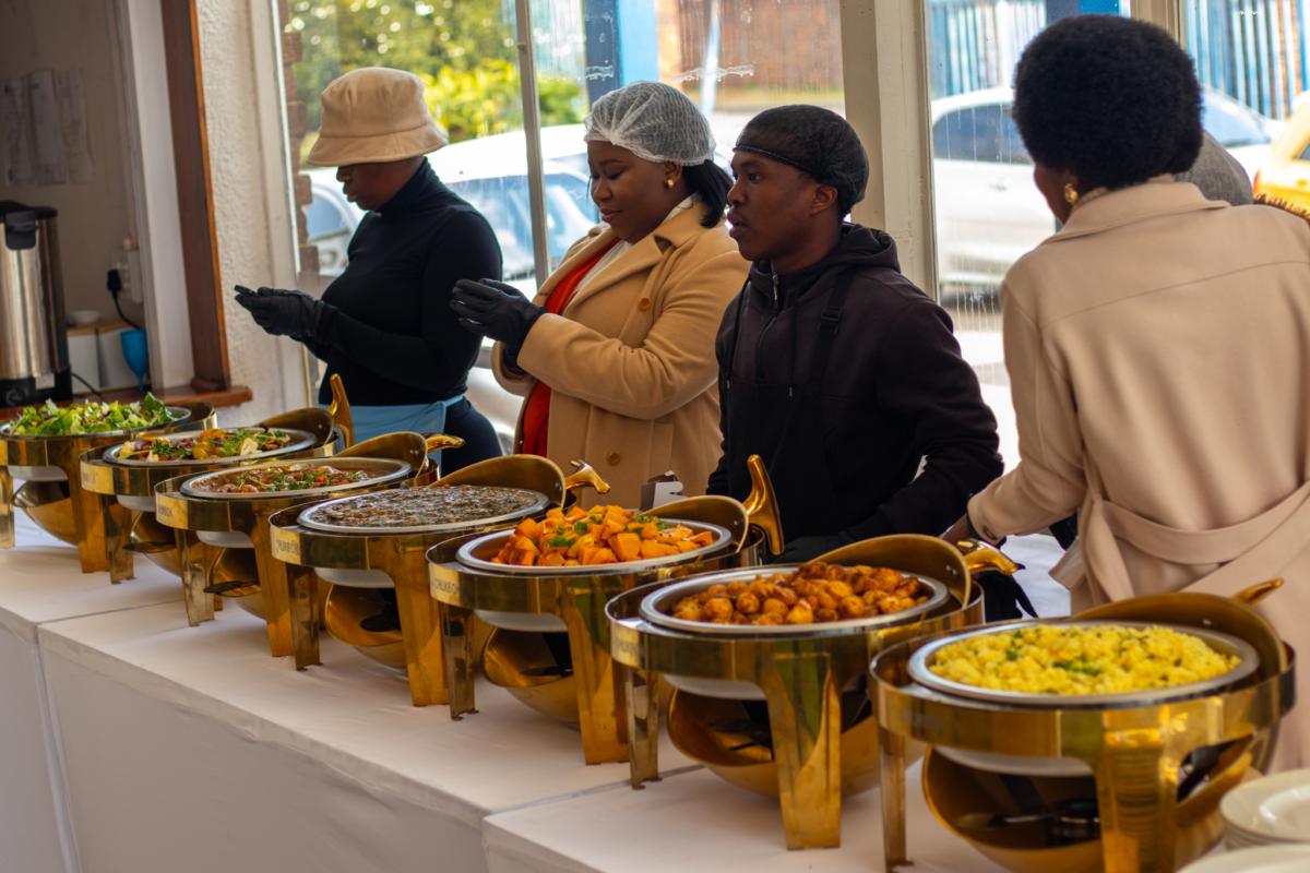Guests at a buffet table