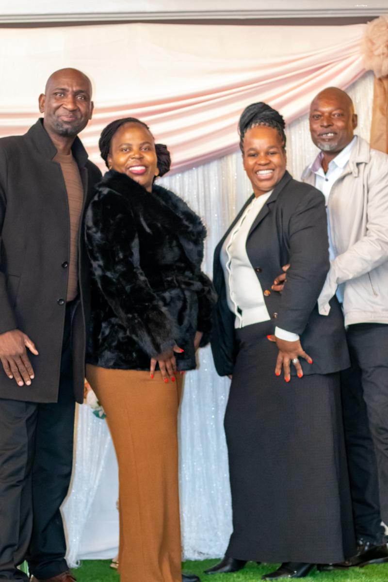 Ministry guests smiling together