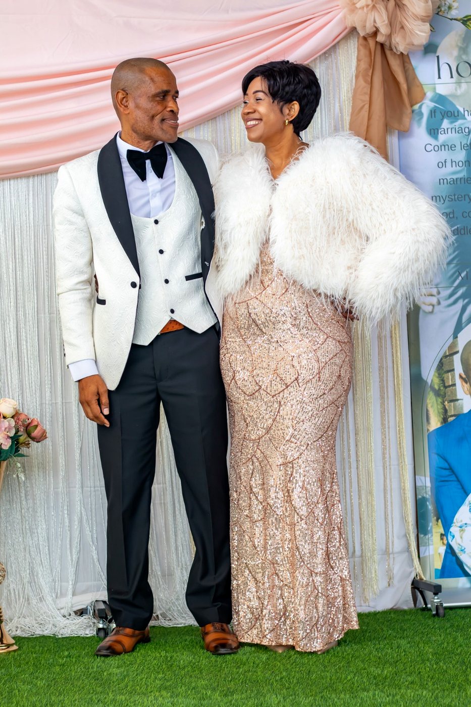 Pastor Phatudi Molapo and his wife smiling at each other