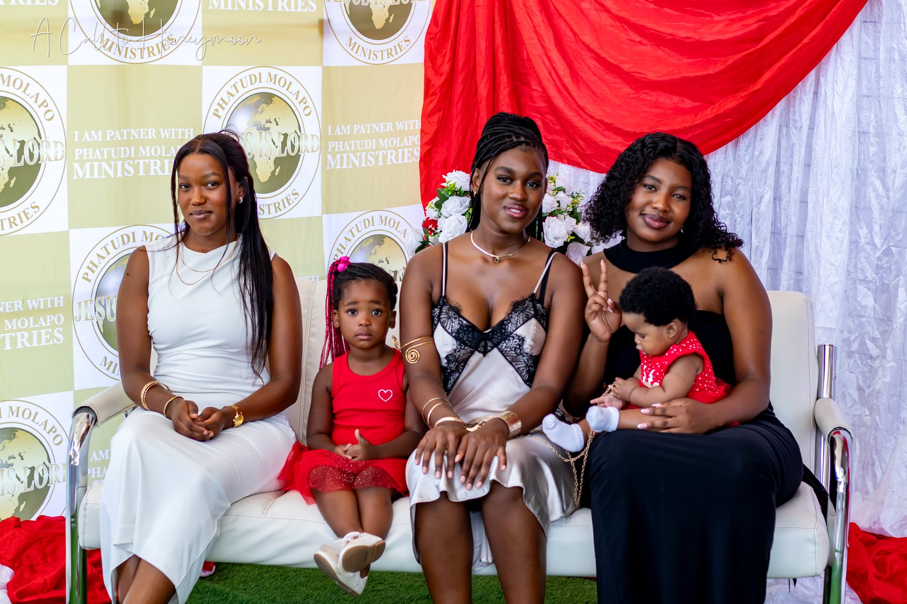 Family seated together during a ministry celebration