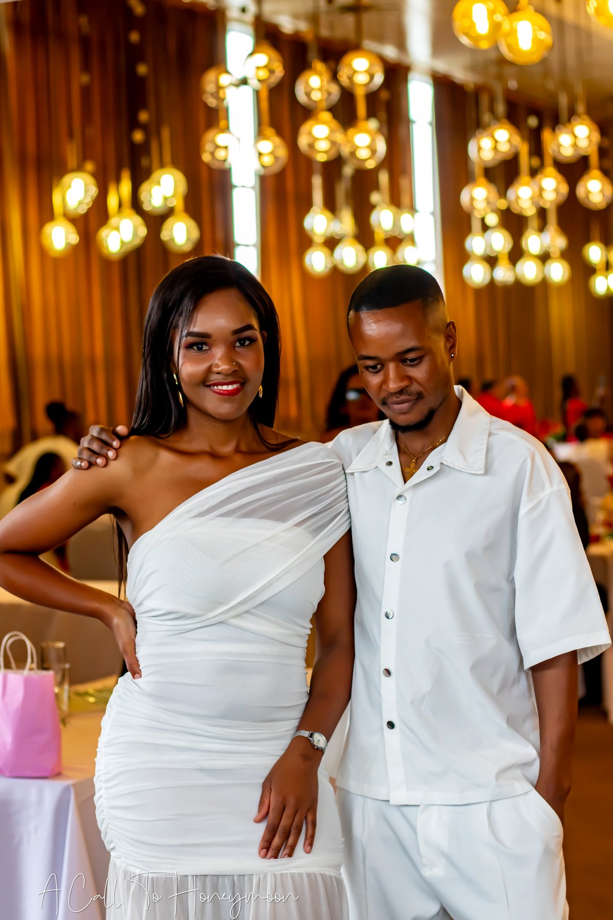 Couple standing together at a celebration