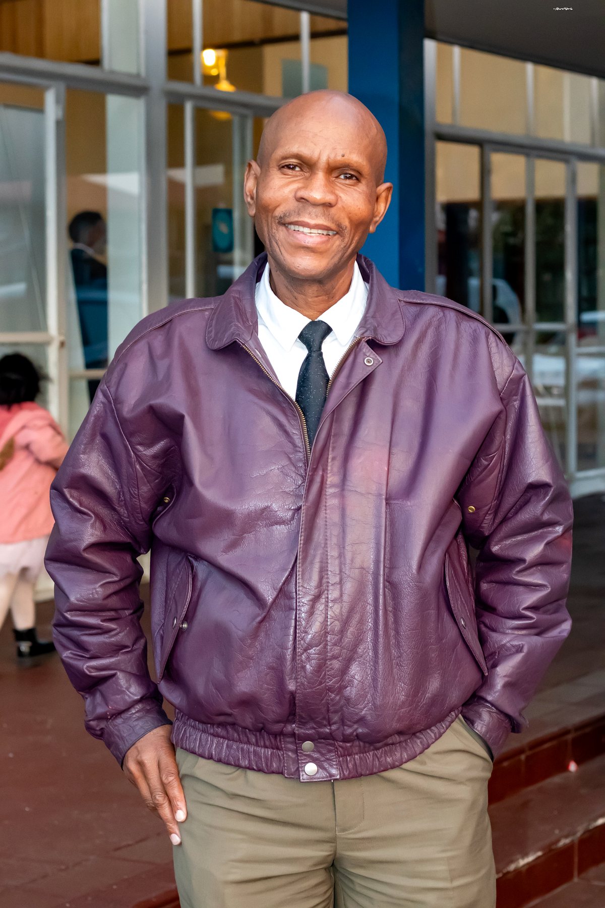 Man smiling outside the ministry venue