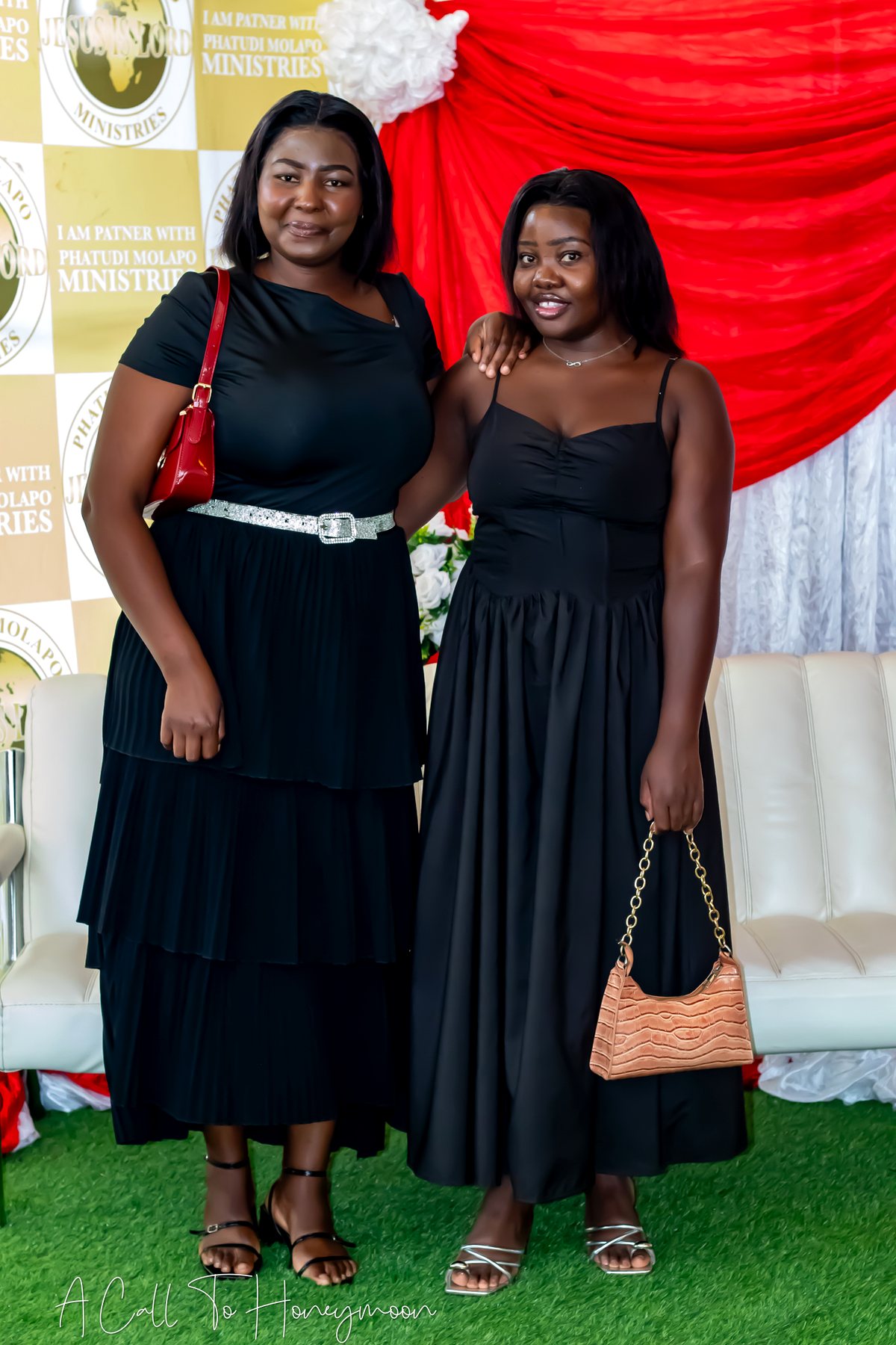 Two women standing together at the ministry photo area
