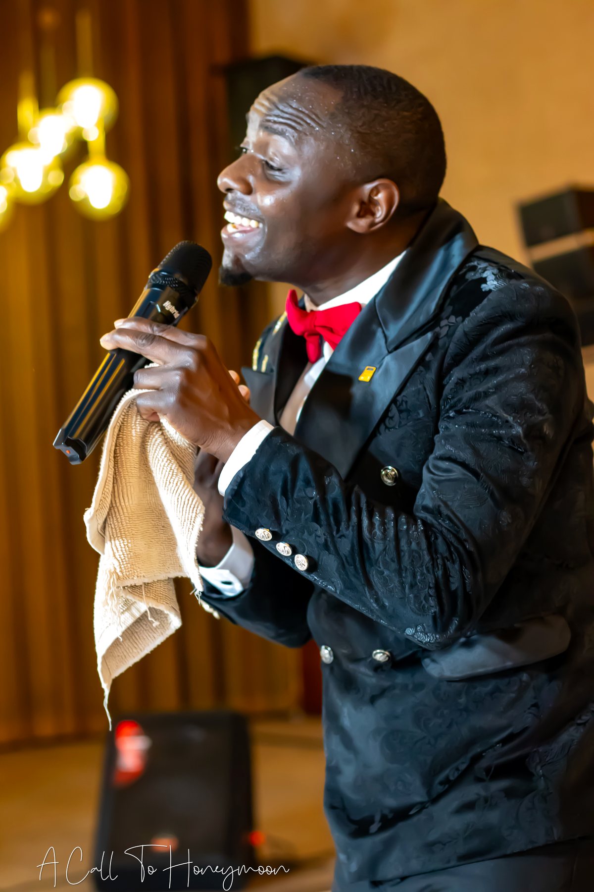 Singer worshipping with a microphone